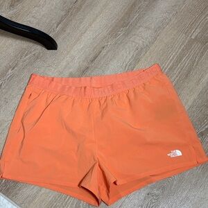 The North Face Women's Vibrant Orange Athletic Shorts